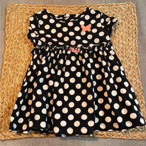 Carter’s Navy and white polka dot dress with pink butterfly and bow details.